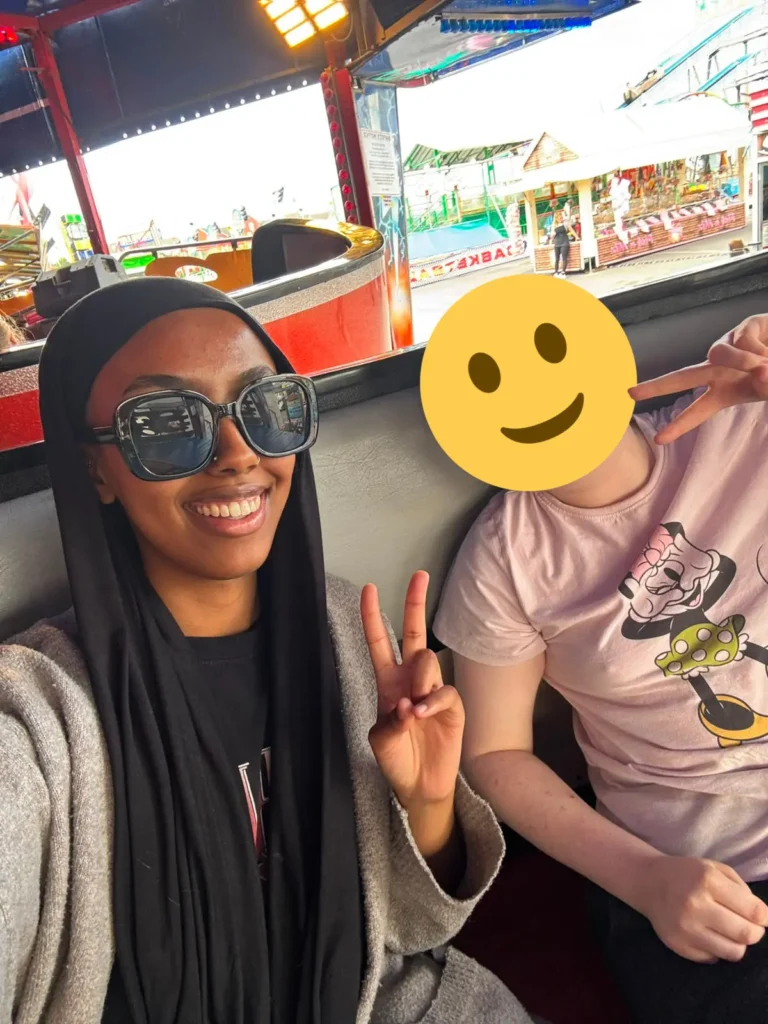 Young person enjoying the Waltzers ride at Barry Island.