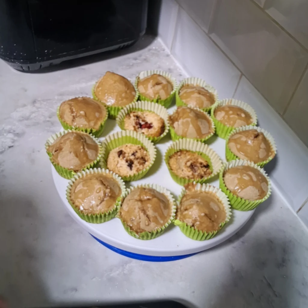 Freshly baked homemade cakes displayed on a plate, showcasing baking skills and independence in the kitchen.